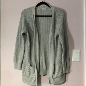 Maurice’s grey cardigan